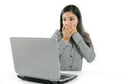 woman discovering laptop problem